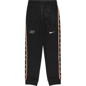Nike Sportswear Kalhoty 'REPEAT' oranžová / černá / bílá