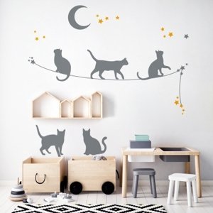 Yokodesign Nástěnná samolepka - stínové obrázky - kočky na laně barva kočky: sv. modrá, barva doplňky: růžová