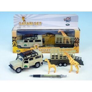 Auto Land Rover Defender s přívěsem a žirafou
