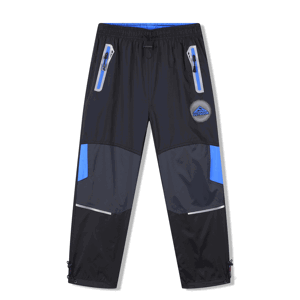 Chlapecké šusťákové kalhoty - KUGO SK7751, černá / modré zipy Barva: Černá, Velikost: 134
