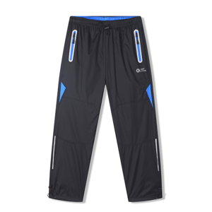 Chlapecké šusťákové kalhoty - KUGO SK7752, černá / modré zipy Barva: Černá, Velikost: 134