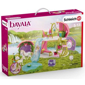 Schleich 42445 třpytivý květinový dům s jednorožci, jezerem a stájí